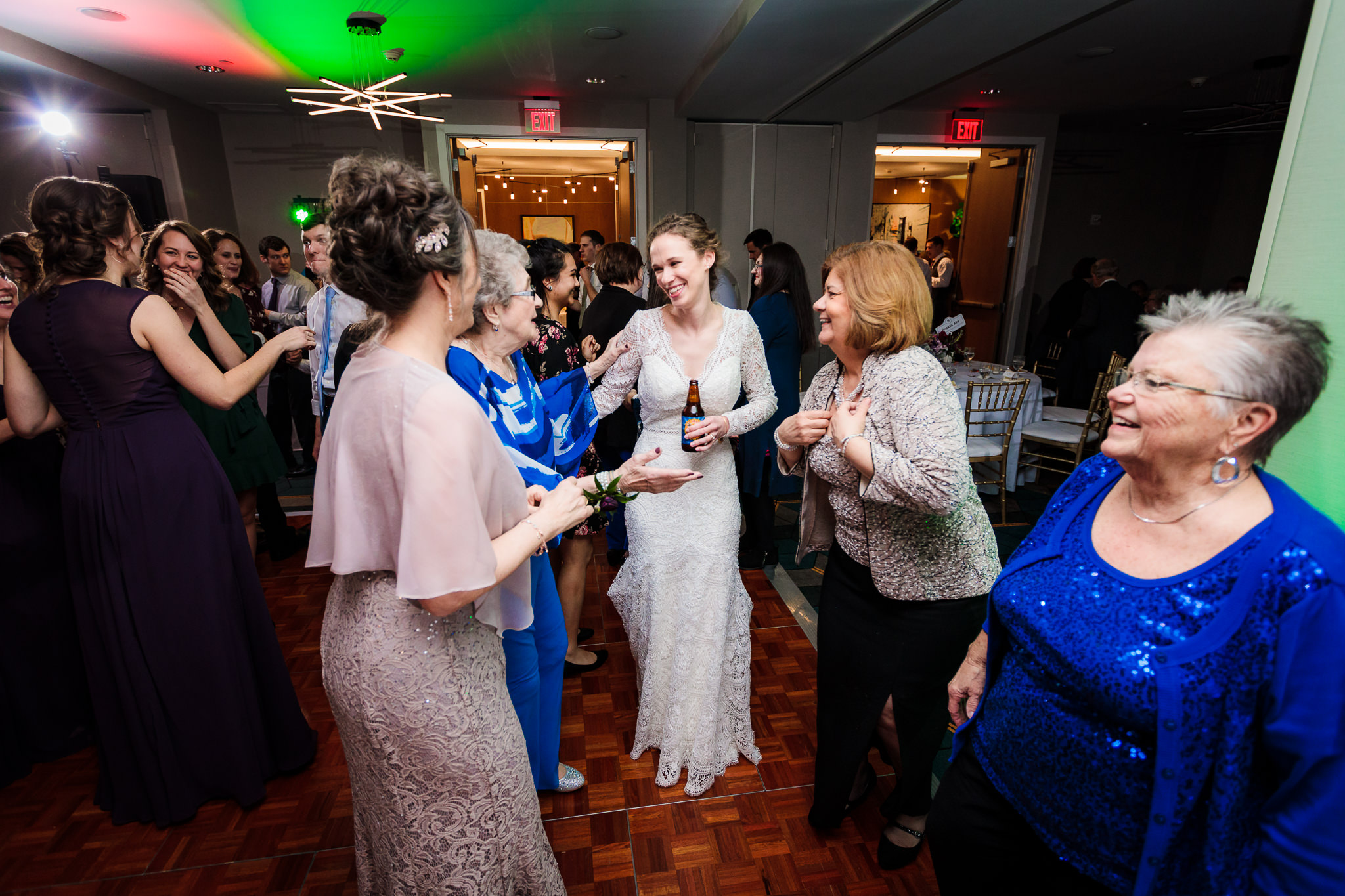 Bride on the dance floor with her mom and grandma at the DoubleTree Pittsburgh Downtown