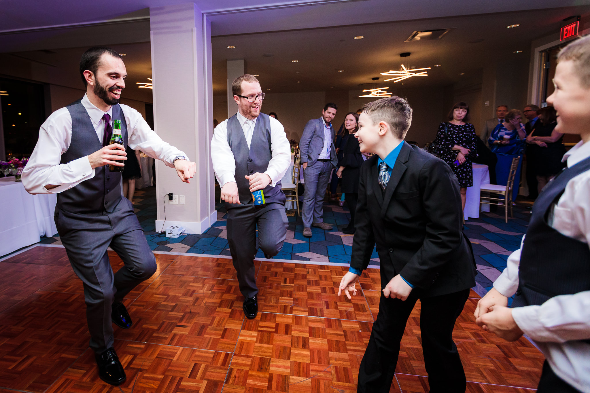 Groom & groomsman show off their dance moves at the DoubleTree Pittsburgh Downtown