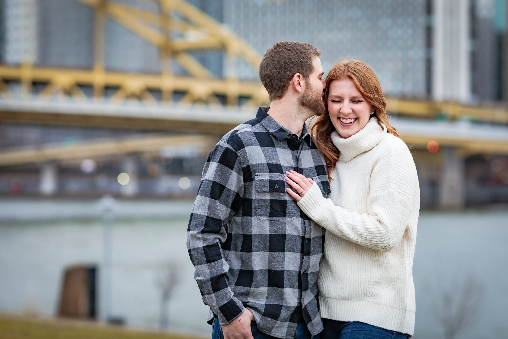 Couple with Ft. Duquesne Bridge backdrop at a North Shore engagement session