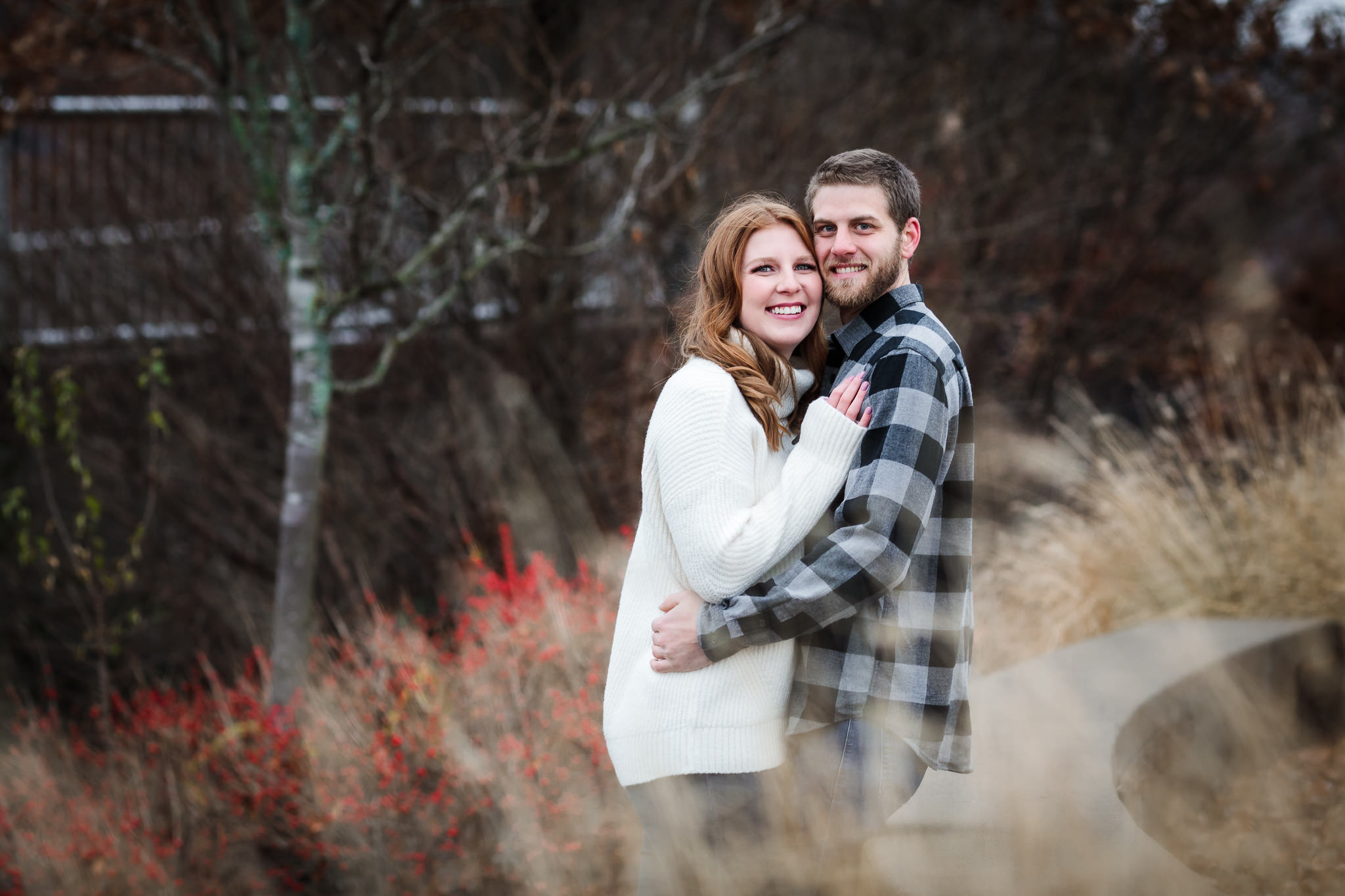 Couple smiles during a December North Shore engagement session