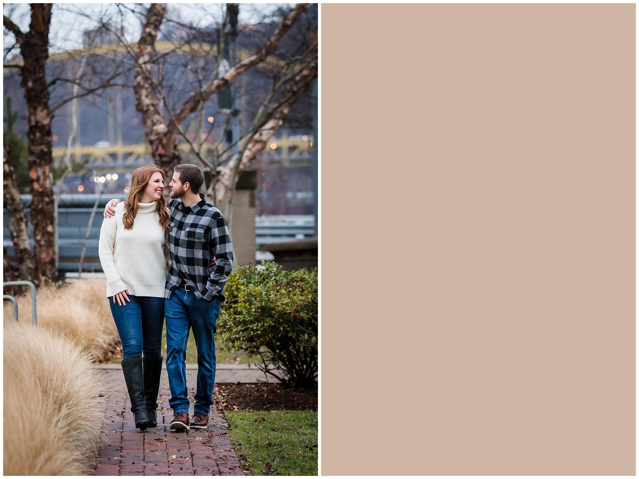 Couple walks down sidewalk during a winter North Shore engagement session